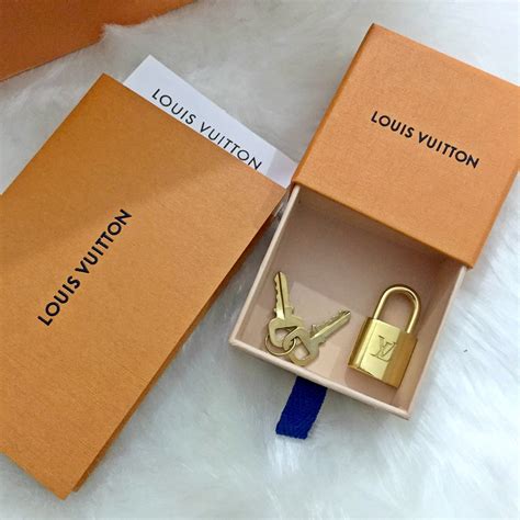 louis vuitton lock necklace real vs fake|duplicate louis vuitton handbags.